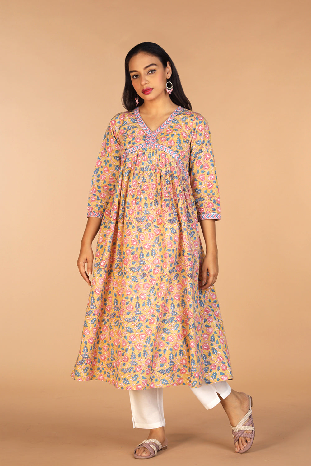 Collection of Floral Sanganeri hand block printed cotton Kurta in a gallery layout