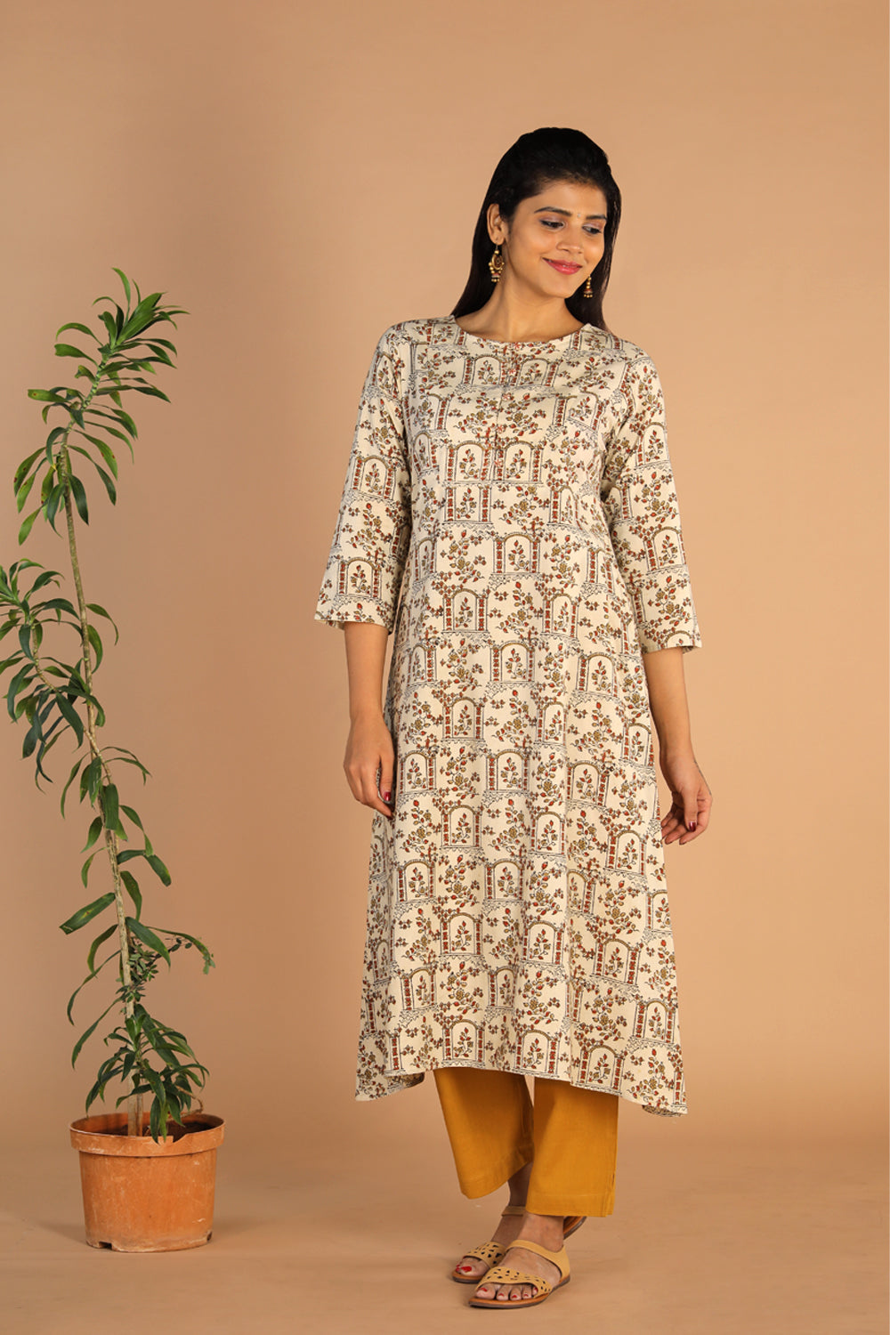 Collection of Ajrakh A -line kurti in a gallery layout