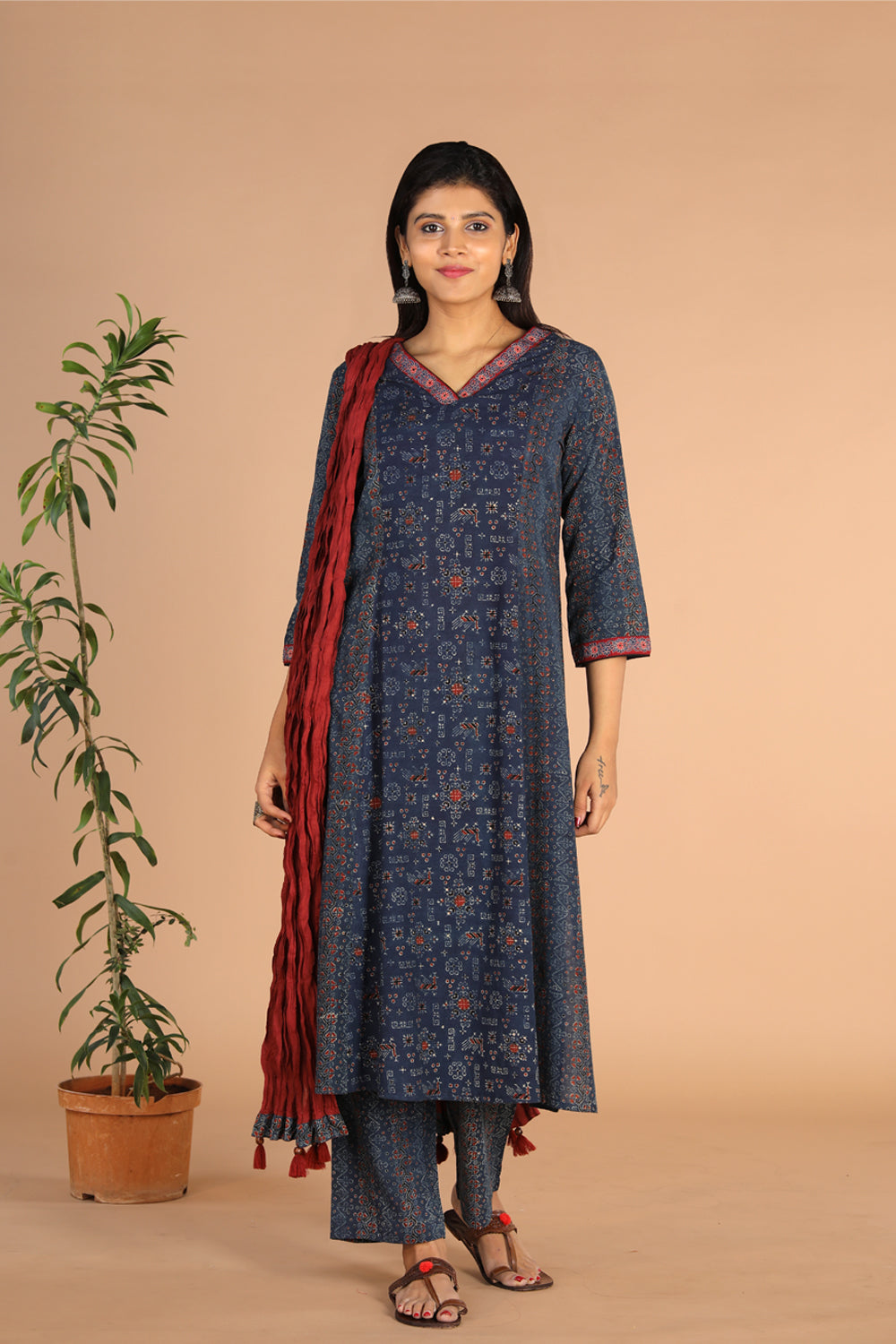 Collection of Indigo Ajrak handblock printed cotton kurta , pants and dupatta set in a gallery layout