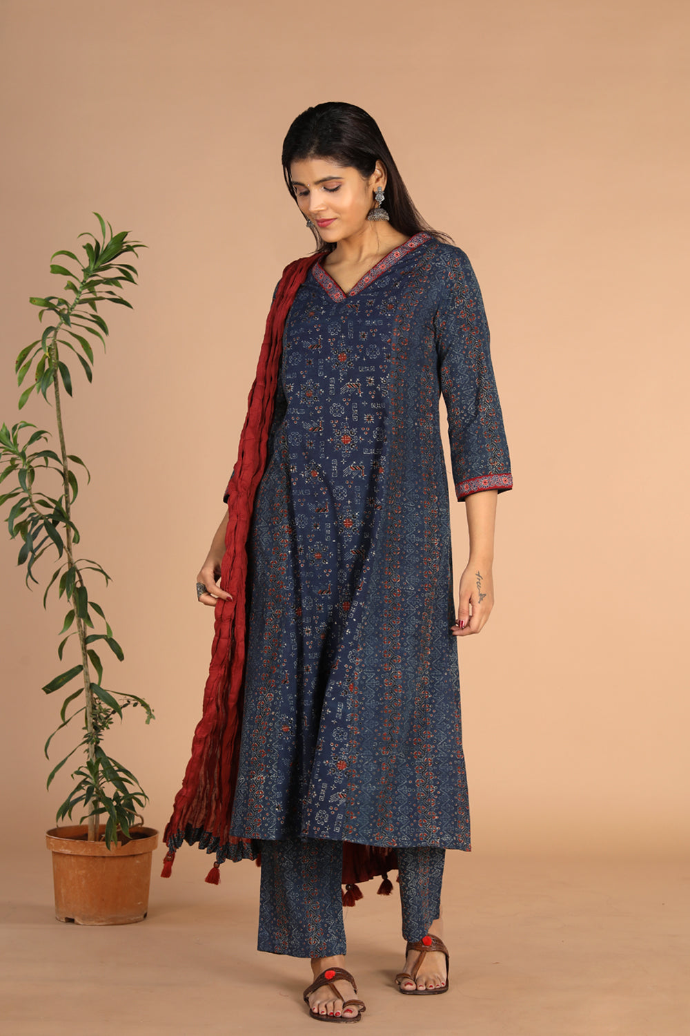 Collection of Indigo Ajrak handblock printed cotton kurta , pants and dupatta set in a gallery layout