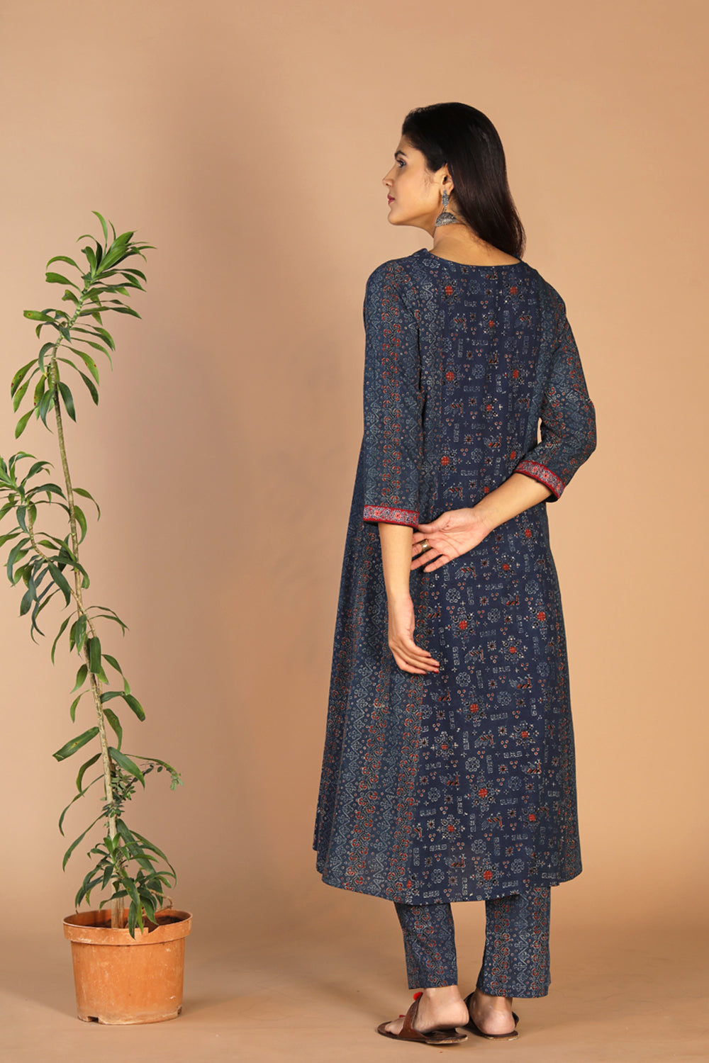 Collection of Indigo Ajrak handblock printed cotton kurta , pants and dupatta set in a gallery layout