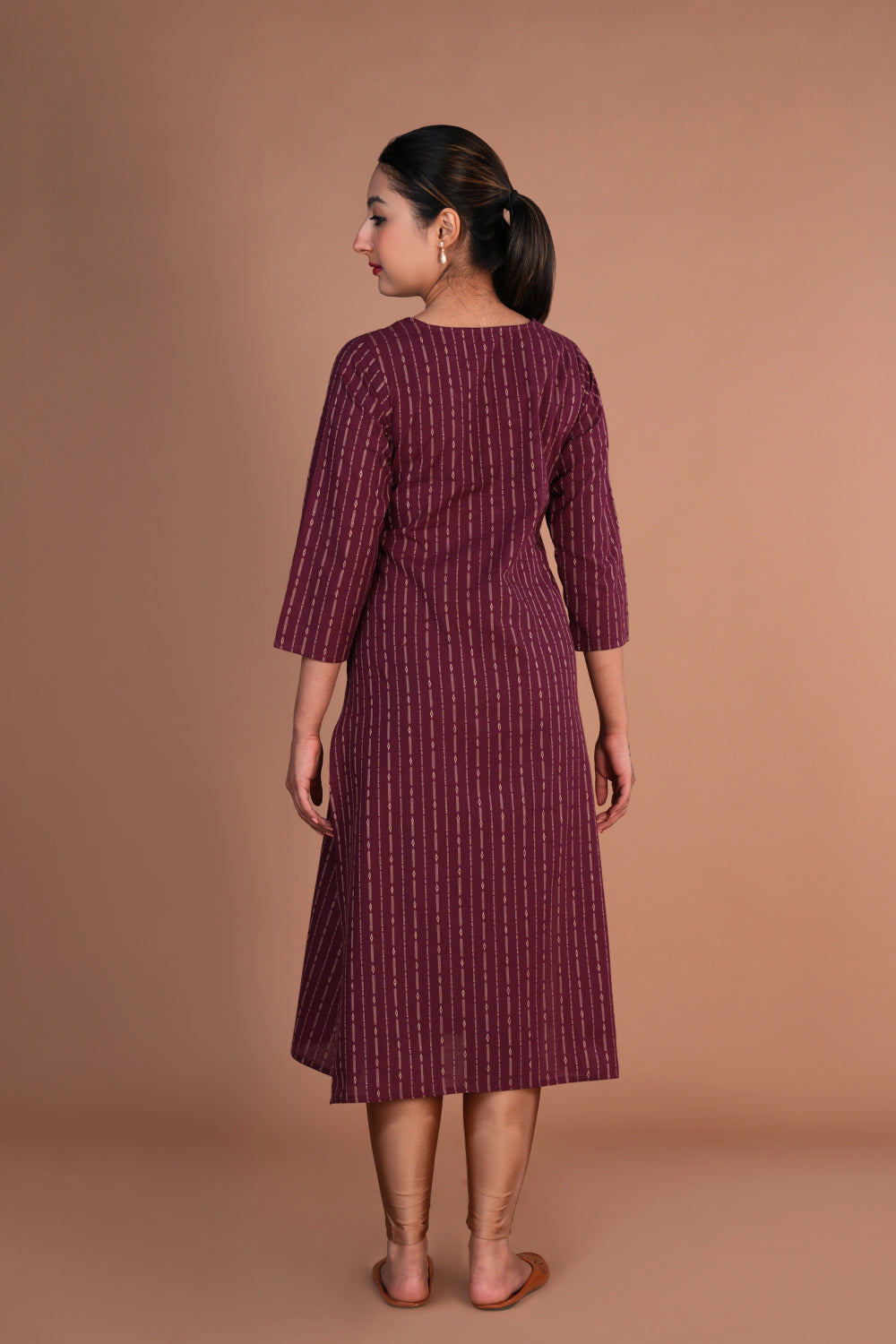 Magenta maroon cotton embroidered Kurti.