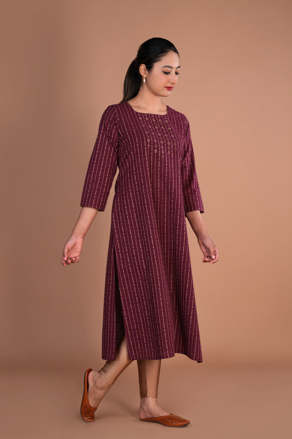 Magenta maroon cotton embroidered Kurti.