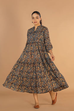 Collection of Kalamkari block printed tiered dress in a gallery layout