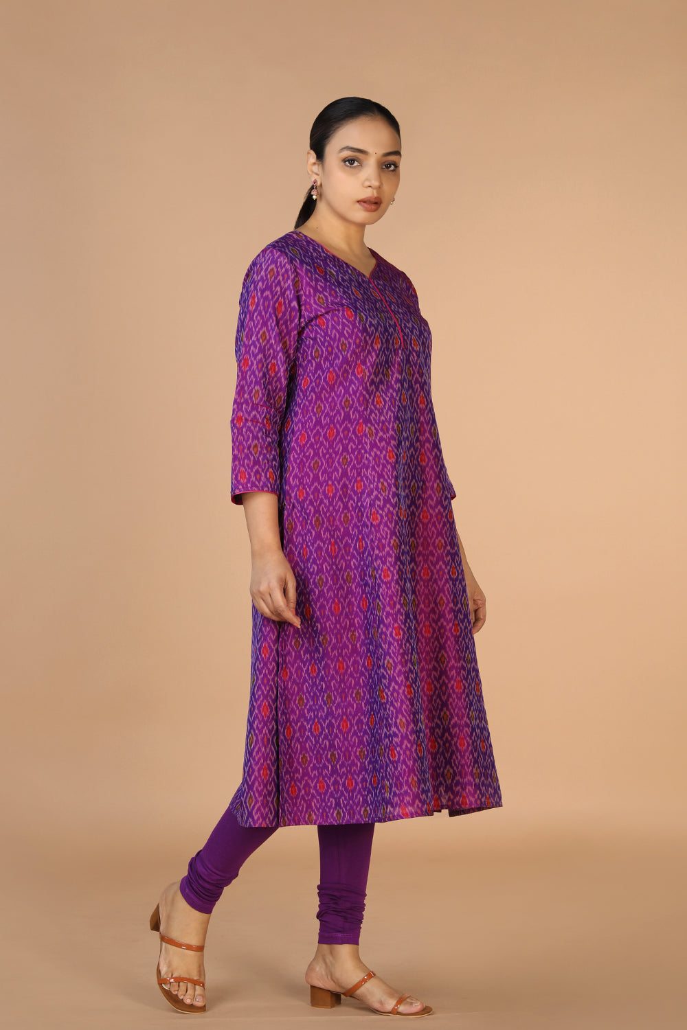 Collection of Purple Silk Pochampally Ikat kurti in a gallery layout