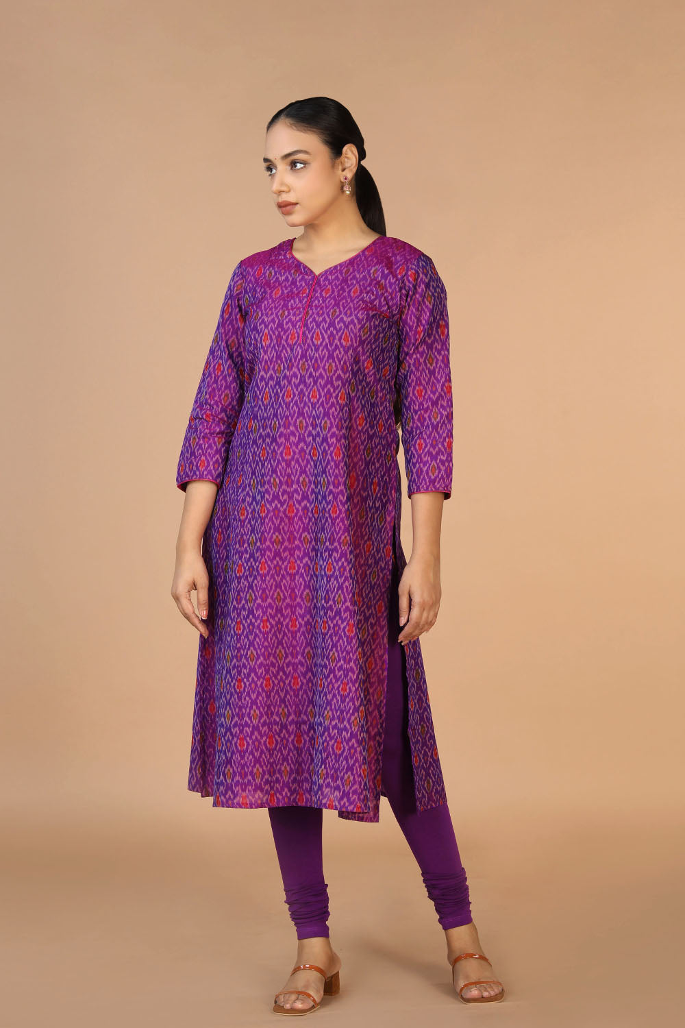 Collection of Purple Silk Pochampally Ikat kurti in a gallery layout