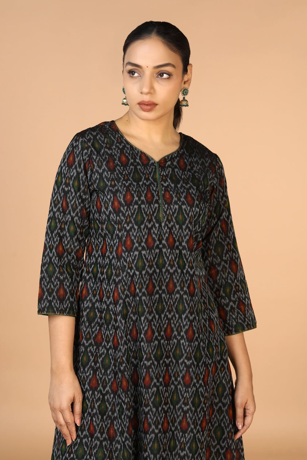 Collection of Black Pochampally silk Ikat Kurti in a gallery layout