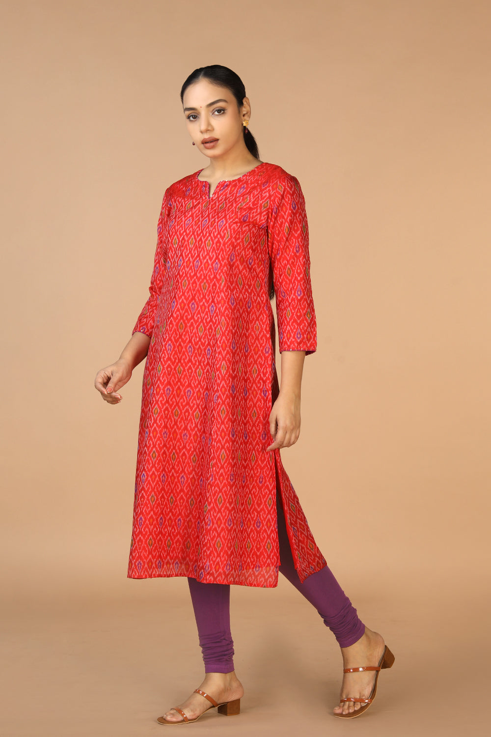 Collection of Vermillion red  Silk Pochampally Ikat kurti in a gallery layout