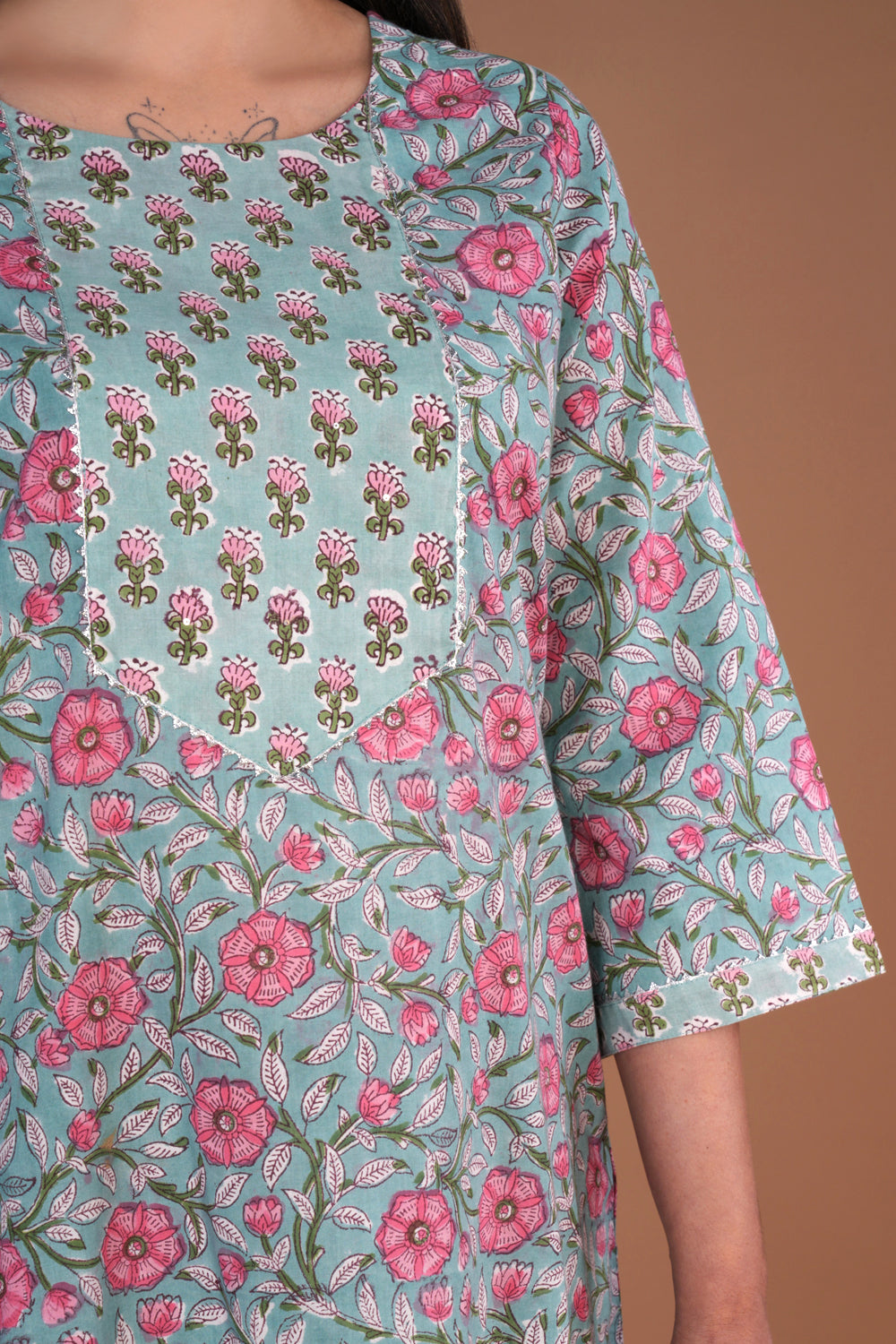 Mint blue floral hand block printed cotton kurta and pants set.