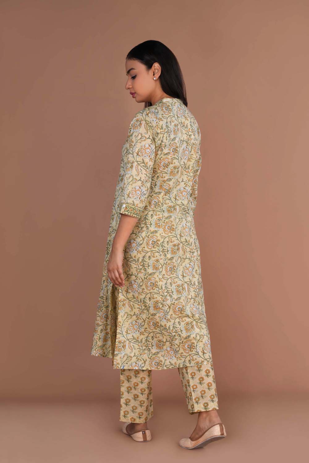 Beige hand block printed cotton kurta and pants set.