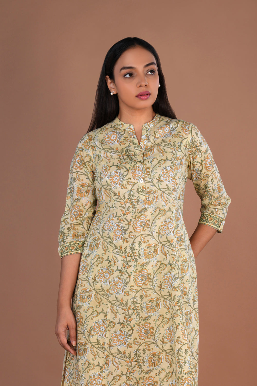 Beige hand block printed cotton kurta and pants set.