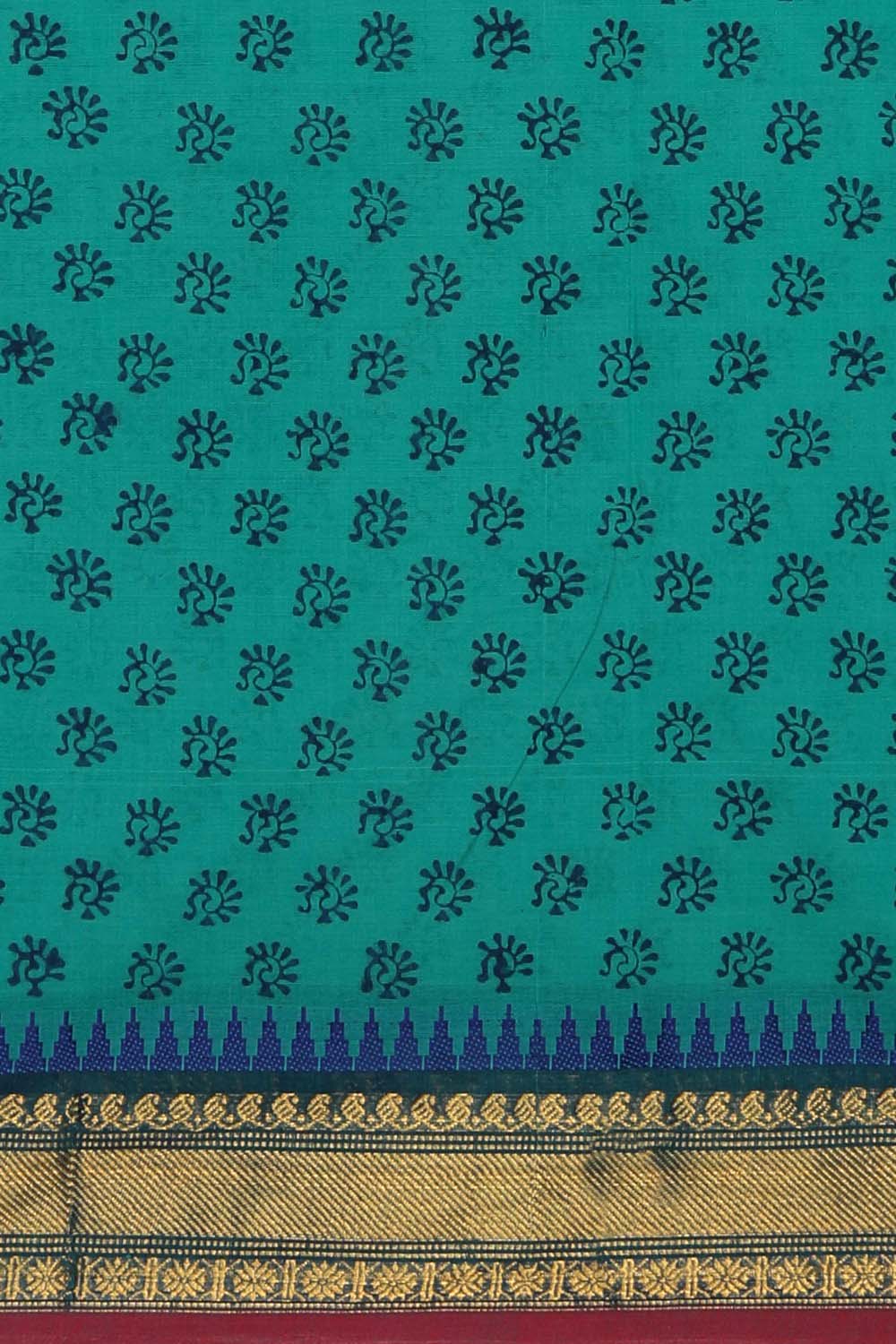 Image of Teal Green floral block printed south cotton saree