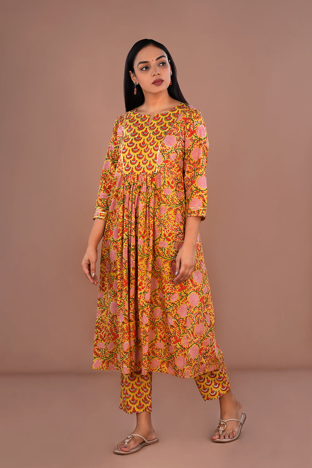 Image of Mustard yellow floral block printed cotton kurta and pants set