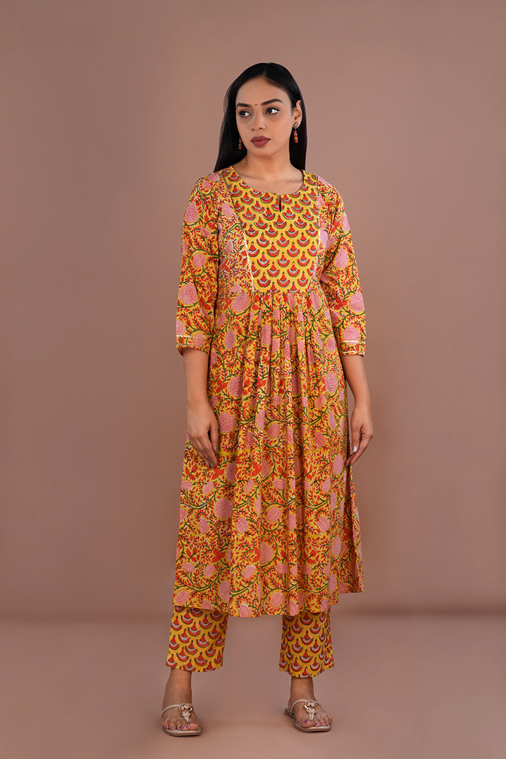 Image of Mustard yellow floral block printed cotton kurta and pants set