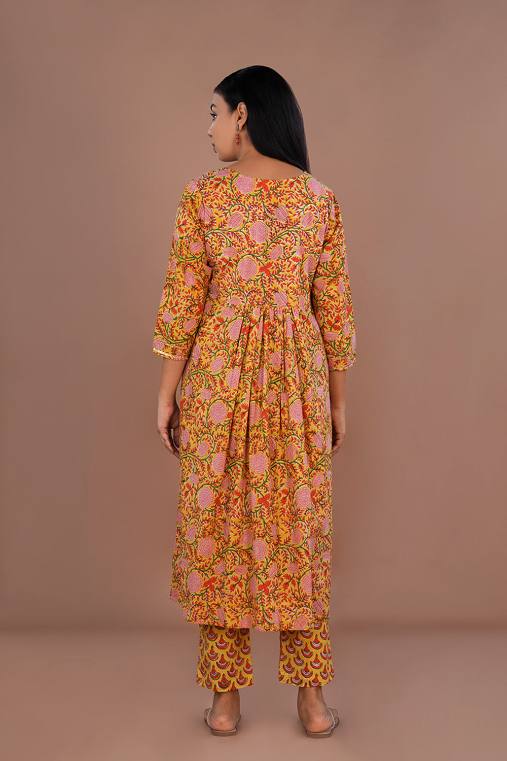 Image of Mustard yellow floral block printed cotton kurta and pants set