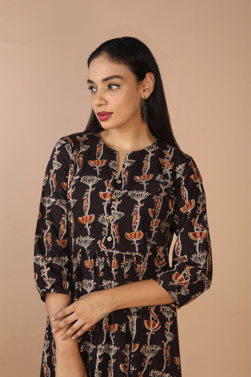 Collection of Charcoal black cotton Kalamkari kurti in a gallery layout