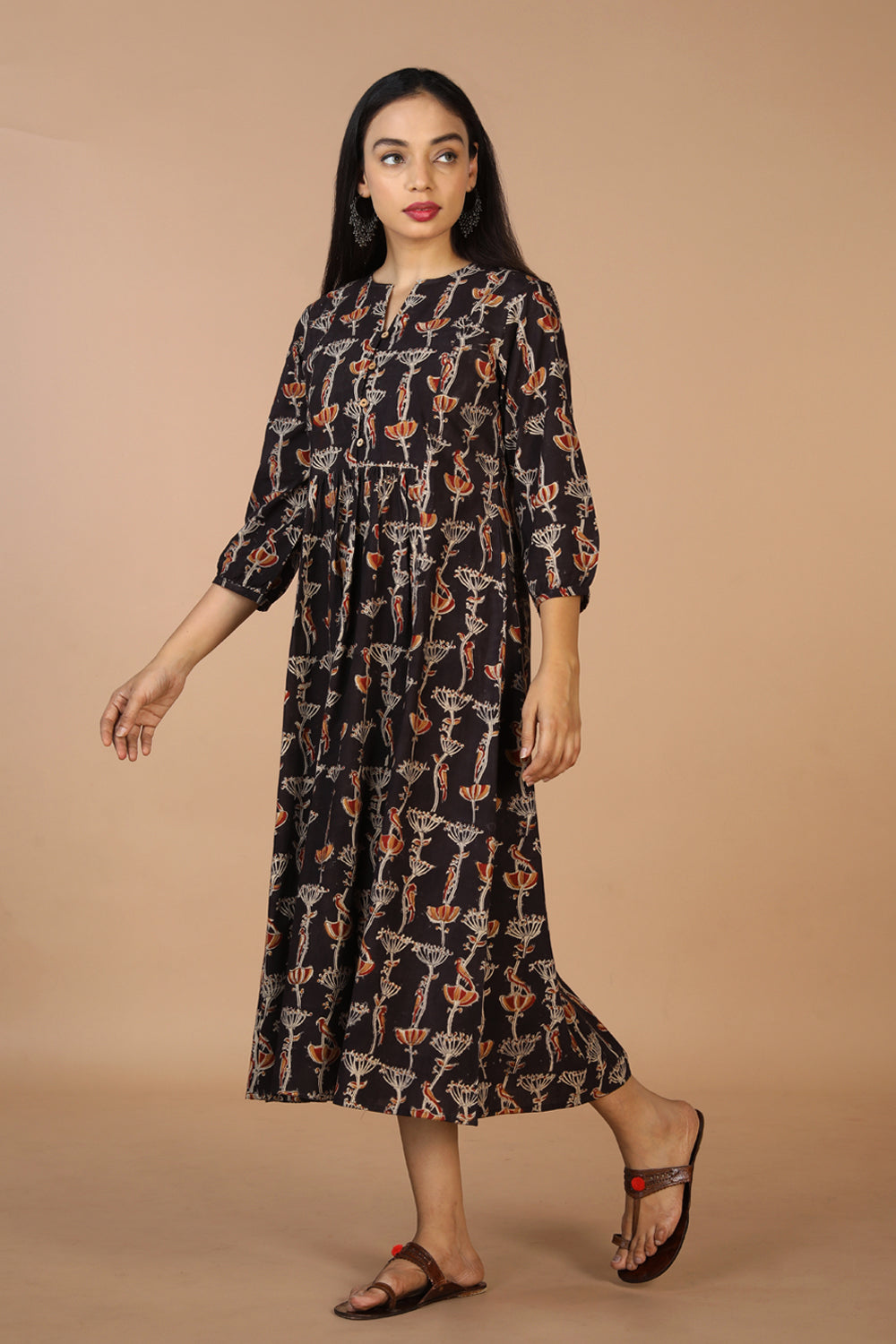 Collection of Charcoal black cotton Kalamkari kurti in a gallery layout