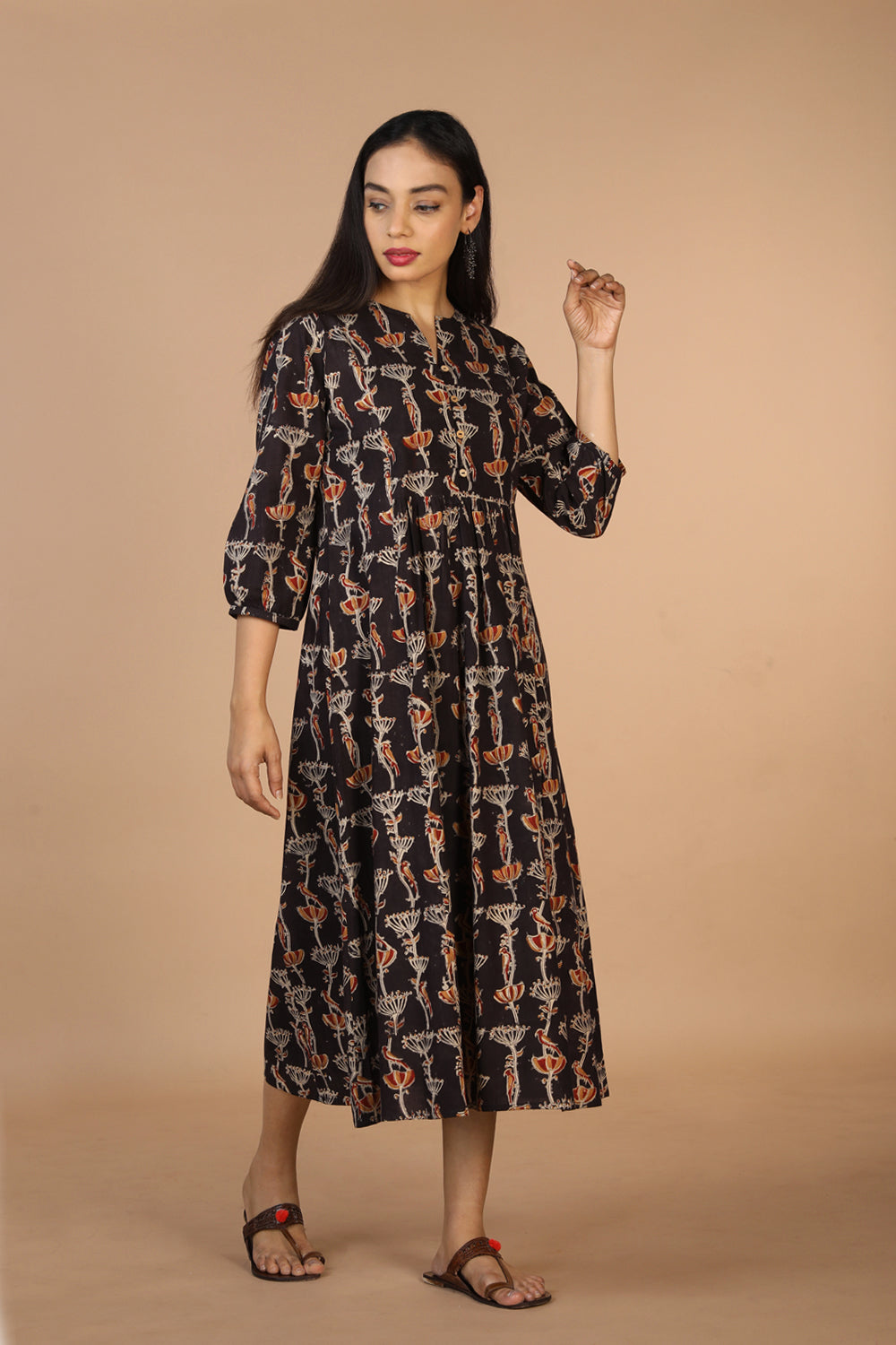 Collection of Charcoal black cotton Kalamkari kurti in a gallery layout