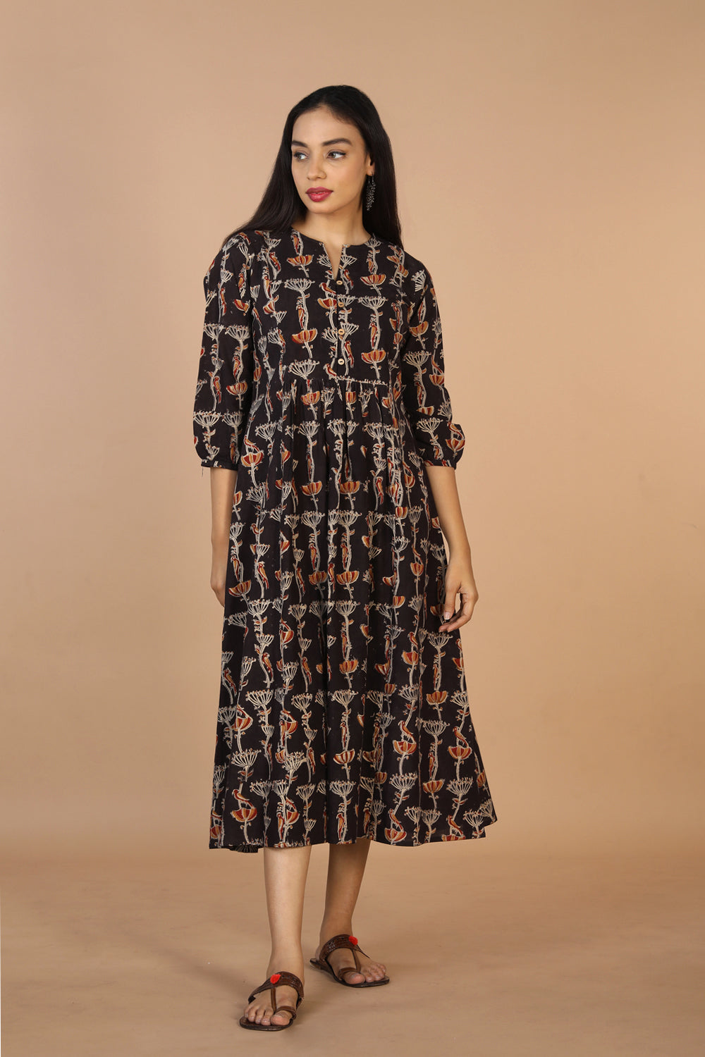 Collection of Charcoal black cotton Kalamkari kurti in a gallery layout