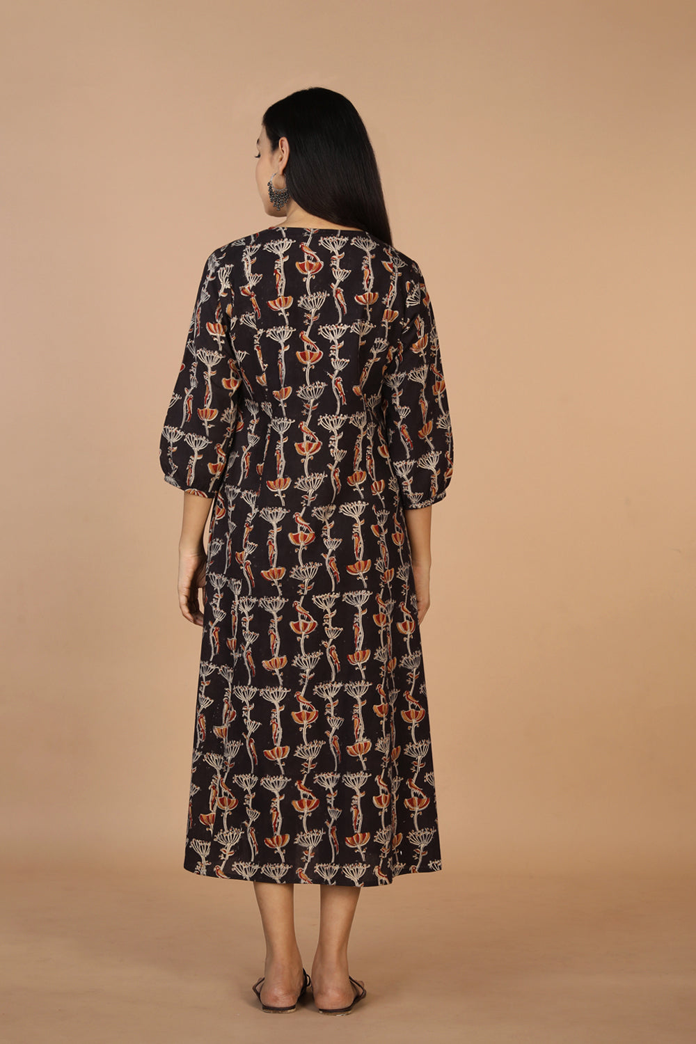 Collection of Charcoal black cotton Kalamkari kurti in a gallery layout