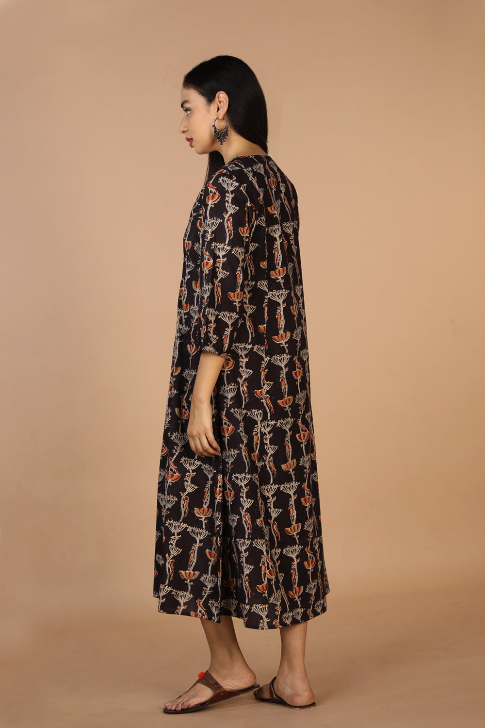 Collection of Charcoal black cotton Kalamkari kurti in a gallery layout