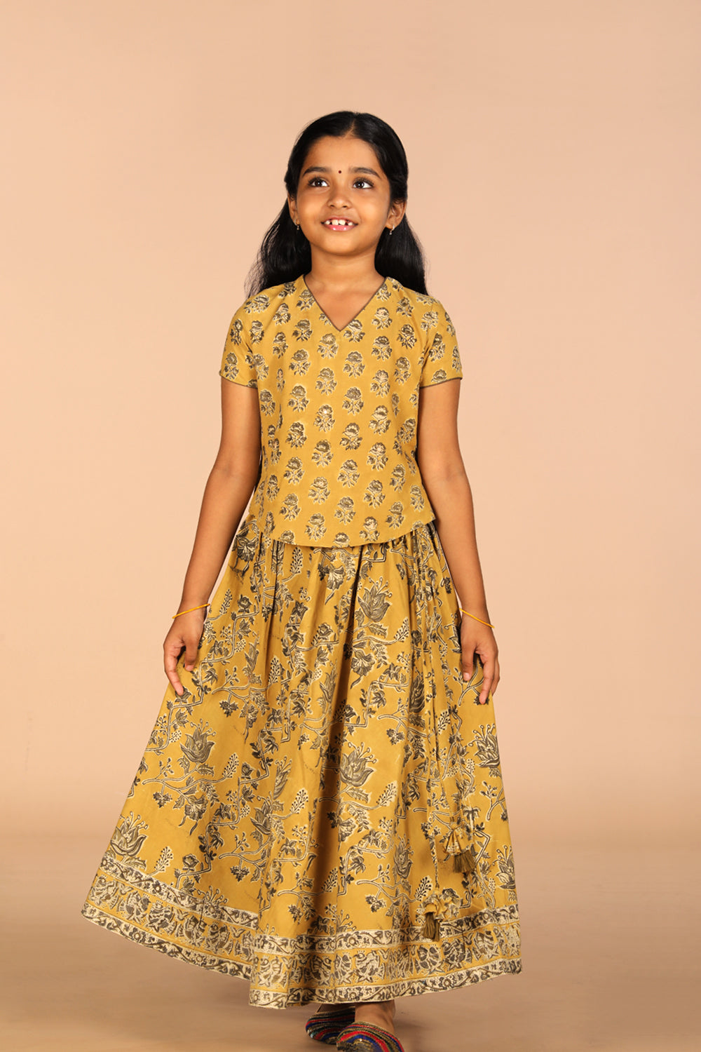 Collection of Cotton Kalamkari girls skirt & top set in a gallery layout