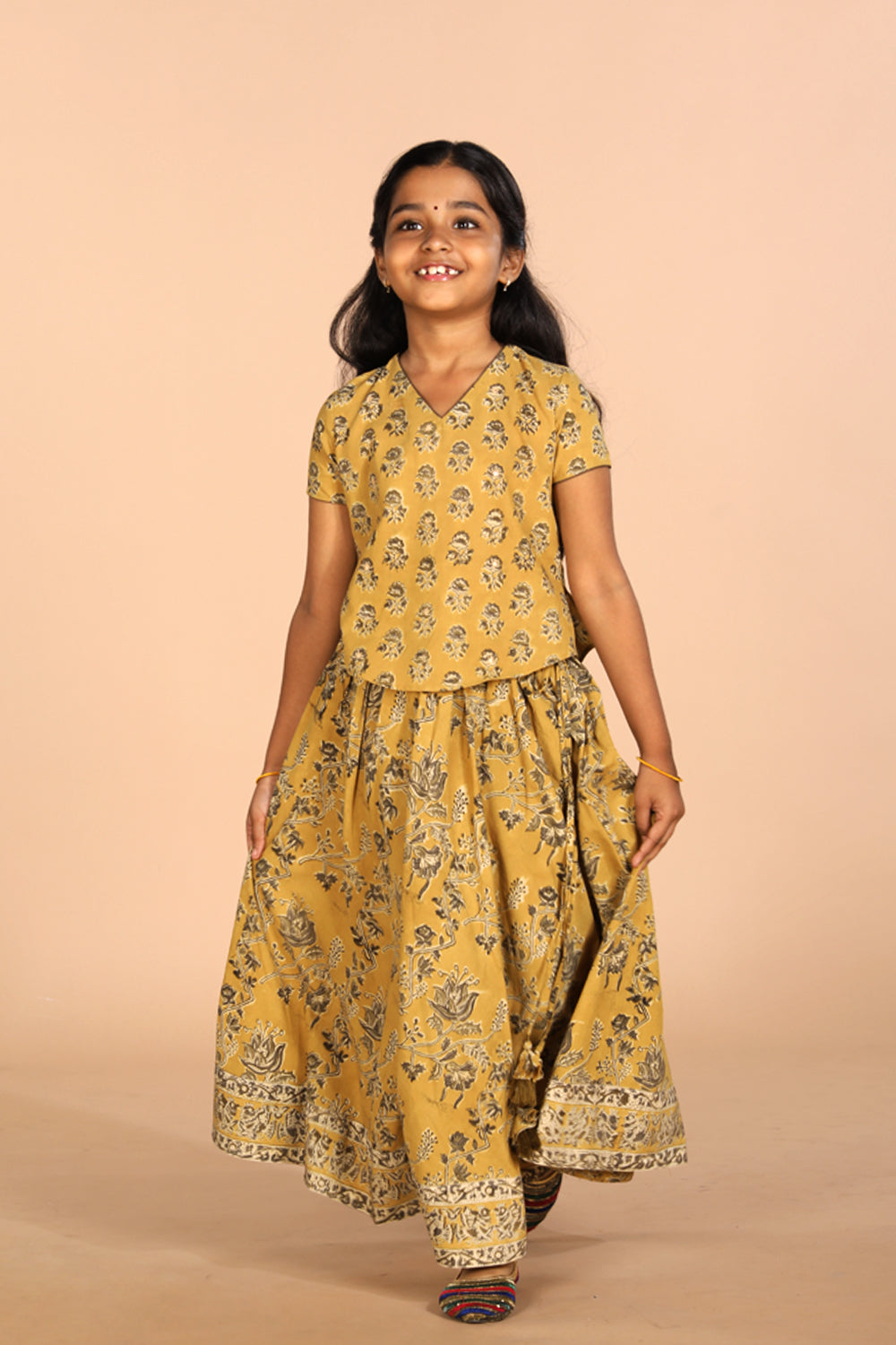 Collection of Cotton Kalamkari girls skirt & top set in a gallery layout