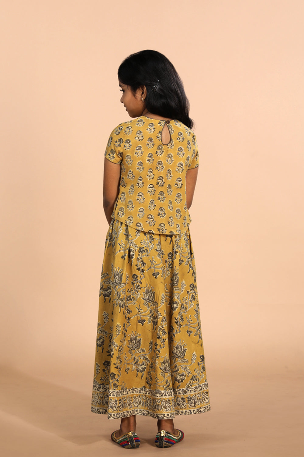 Collection of Cotton Kalamkari girls skirt & top set in a gallery layout