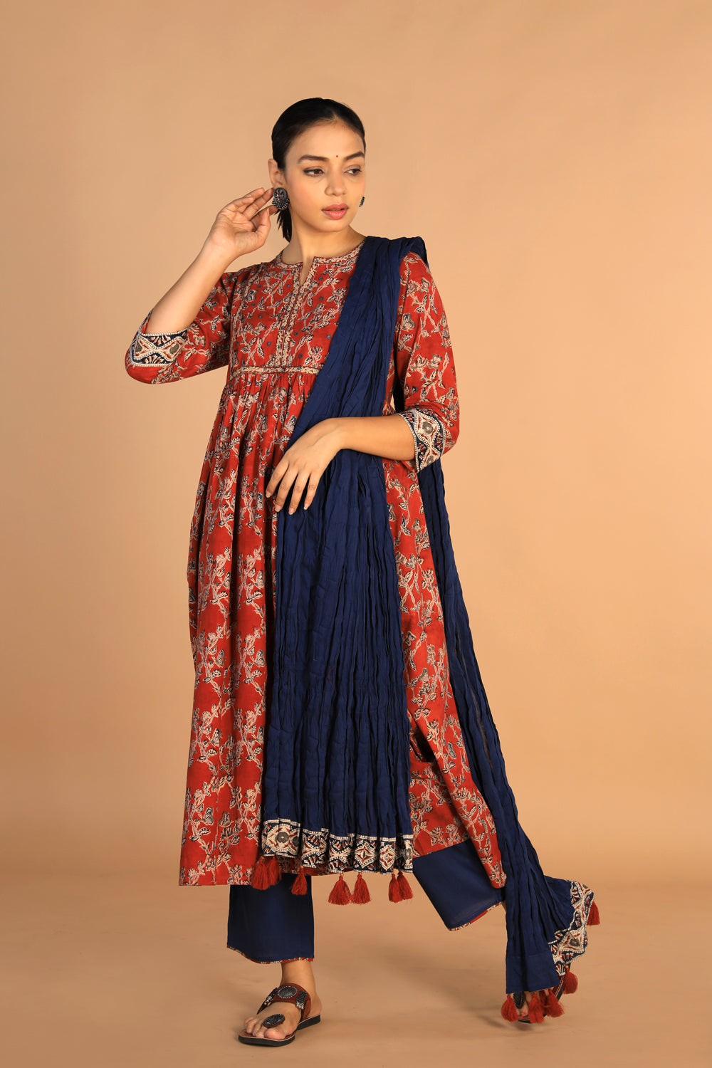 Collection of Maroon and indigo cotton Kalamkari set in a gallery layout