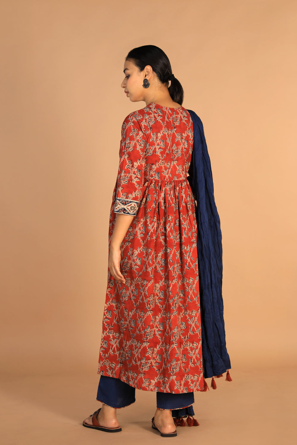 Collection of Maroon and indigo cotton Kalamkari set in a gallery layout