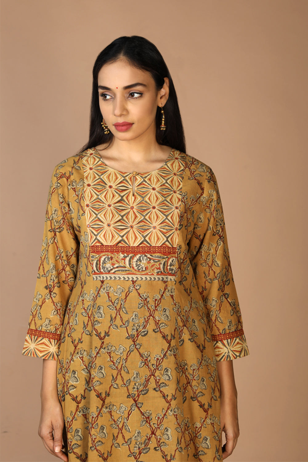 Collection of Ethnic embroidered Kalamkari kurti in a gallery layout