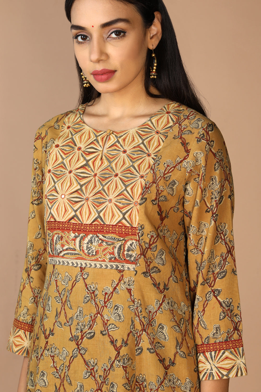 Collection of Ethnic embroidered Kalamkari kurti in a gallery layout