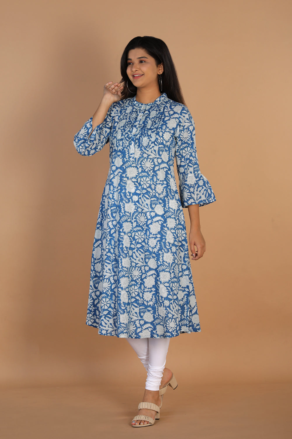 Collection of Floral block printed cotton kurta in a gallery layout