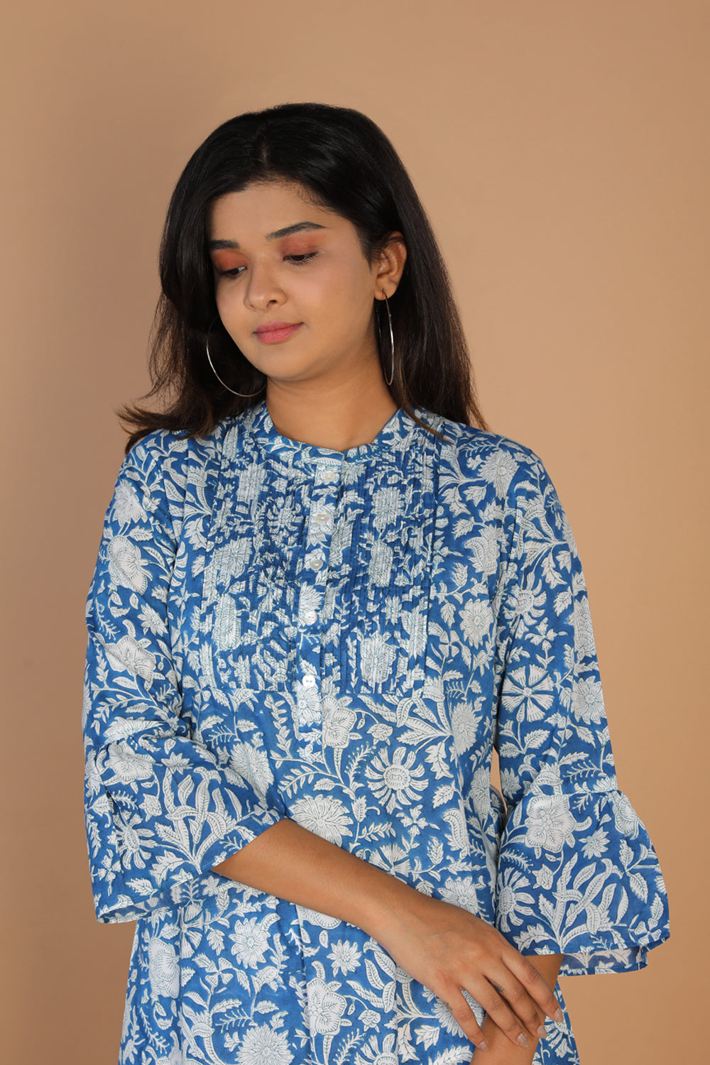 Collection of Floral block printed cotton kurta in a gallery layout