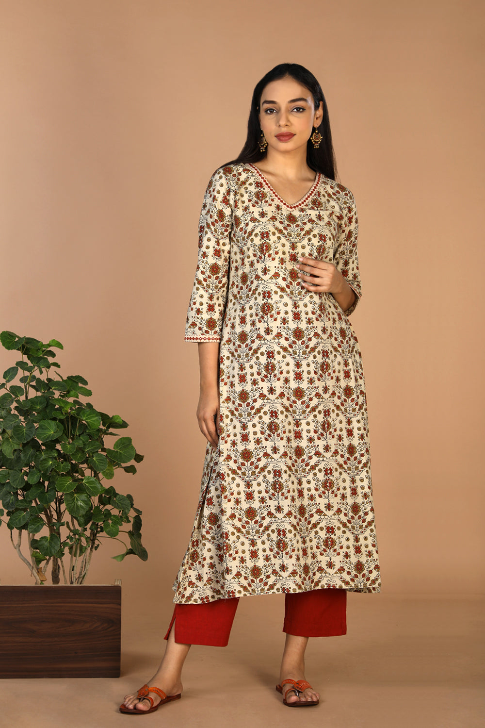 Collection of Ajrakh embroidered A line kurti in a gallery layout