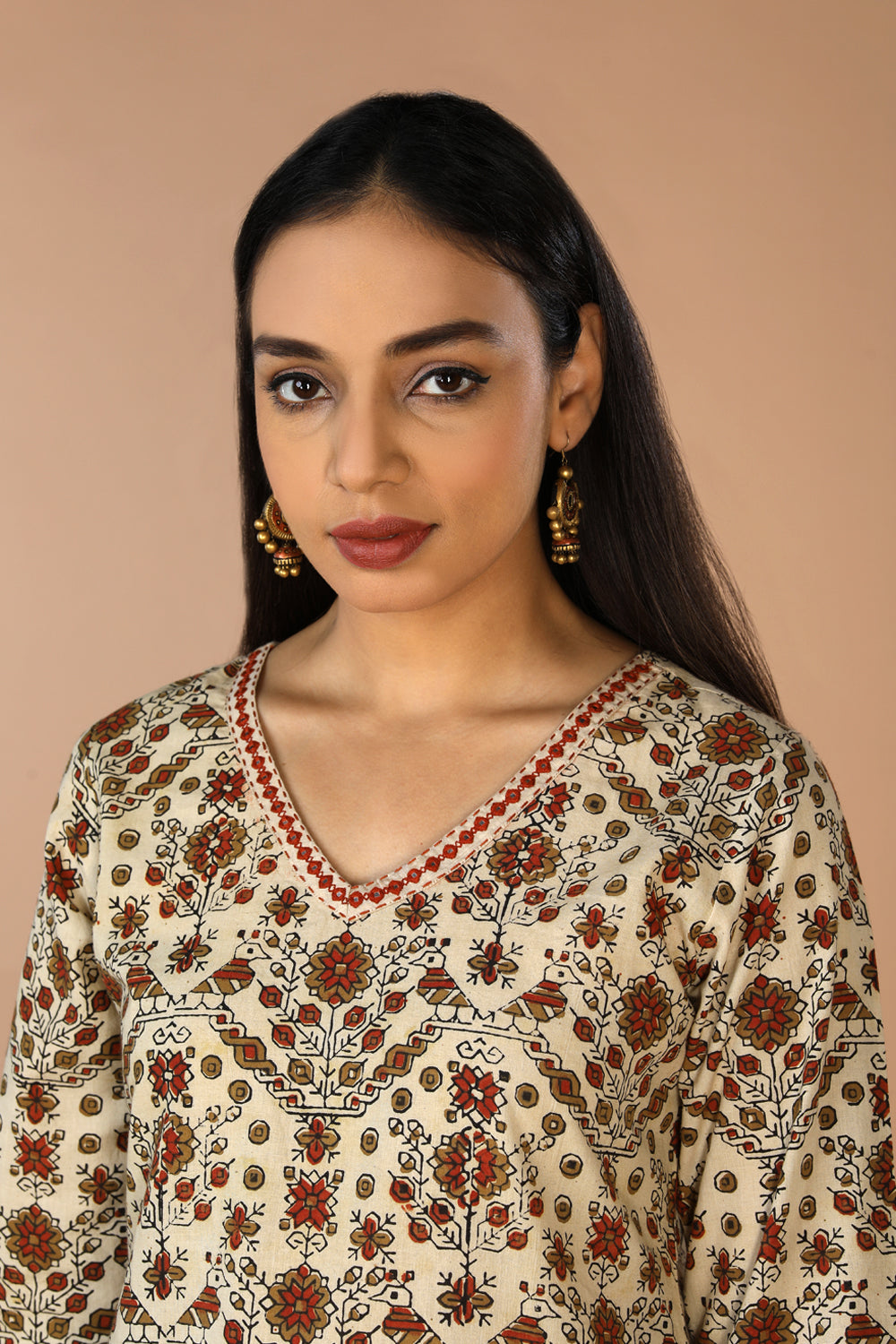 Collection of Ajrakh embroidered A line kurti in a gallery layout