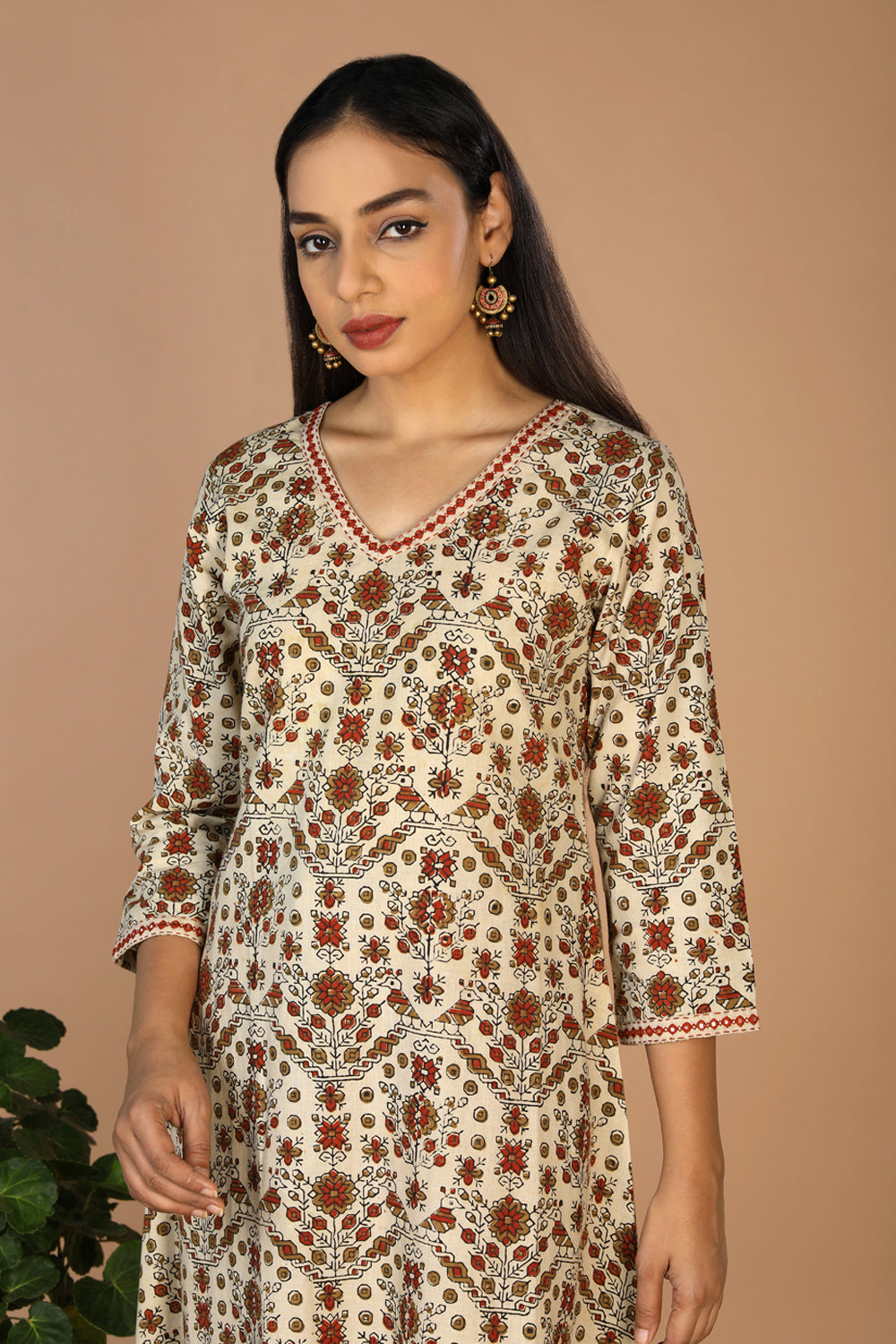 Collection of Ajrakh embroidered A line kurti in a gallery layout