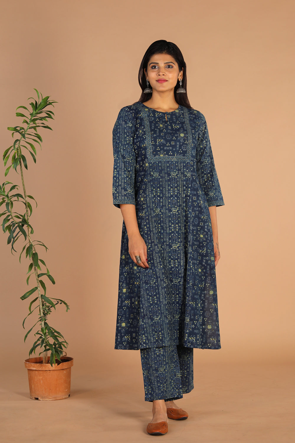 Collection of Indigo Ajrak handblock printed cotton kurta , pants set in a gallery layout