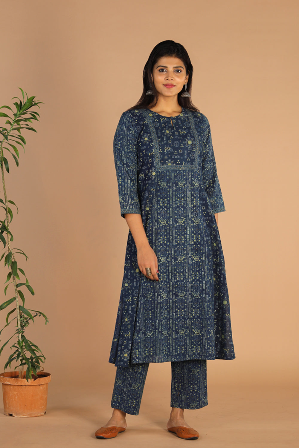 Collection of Indigo Ajrak handblock printed cotton kurta , pants set in a gallery layout