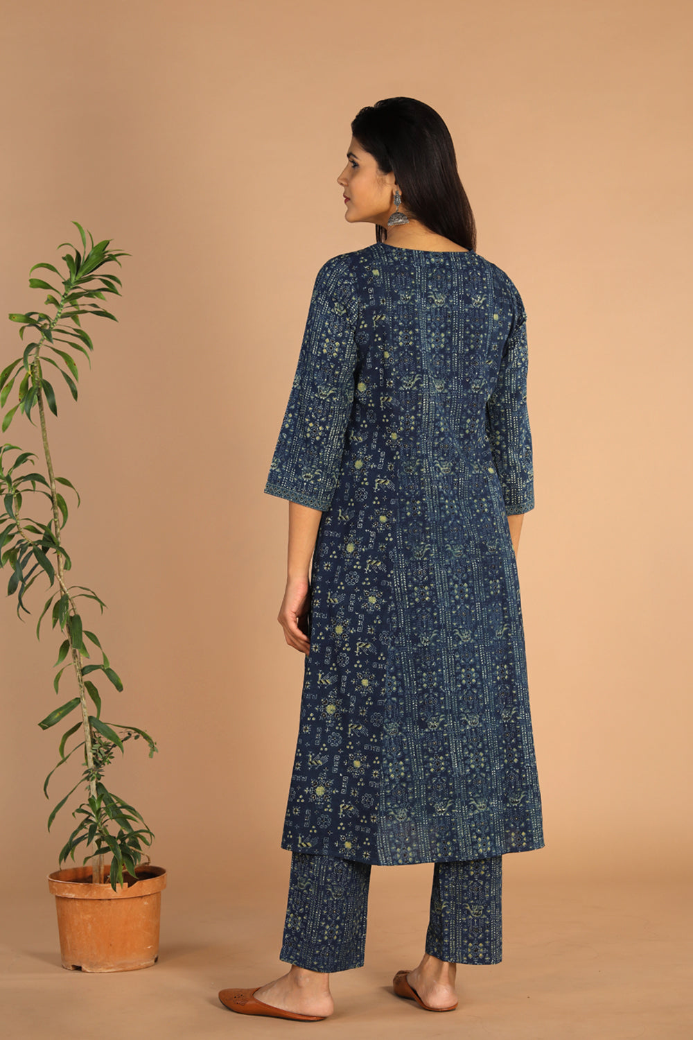 Collection of Indigo Ajrak handblock printed cotton kurta , pants set in a gallery layout