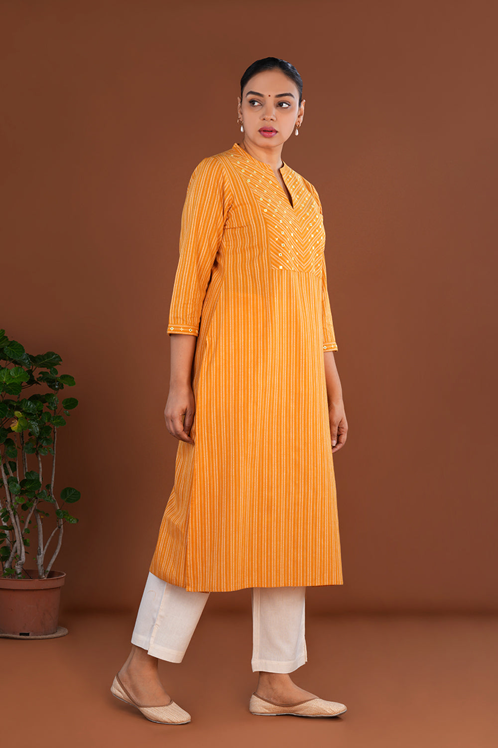 Powder Yellow embroidered cotton Kurti