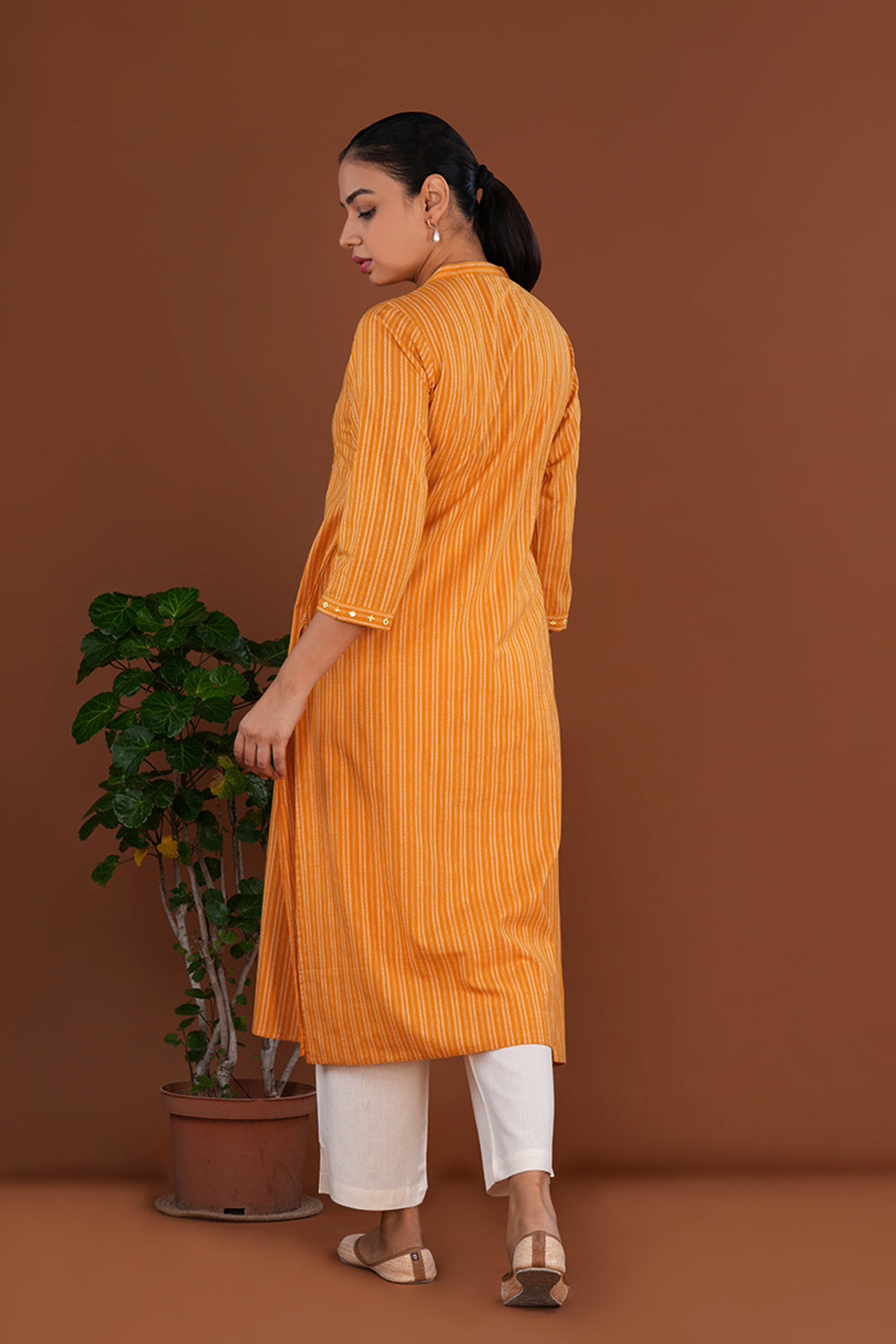 Powder Yellow embroidered cotton Kurti