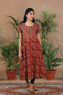 Collection of Maroon floral Kalamkari handblockprinted kurti in a gallery layout