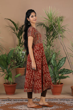 Collection of Maroon floral Kalamkari handblockprinted kurti in a gallery layout