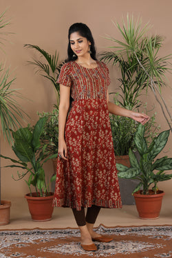 Collection of Maroon floral Kalamkari handblockprinted kurti in a gallery layout