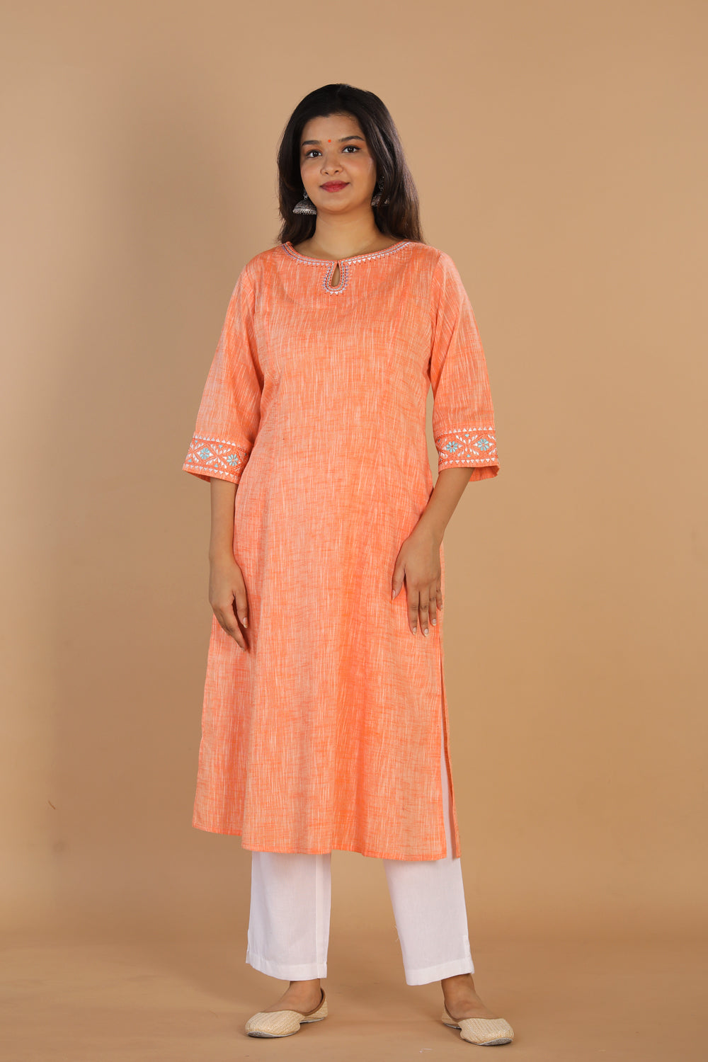 Collection of Traditional embroidered cotton kurta in a gallery layout