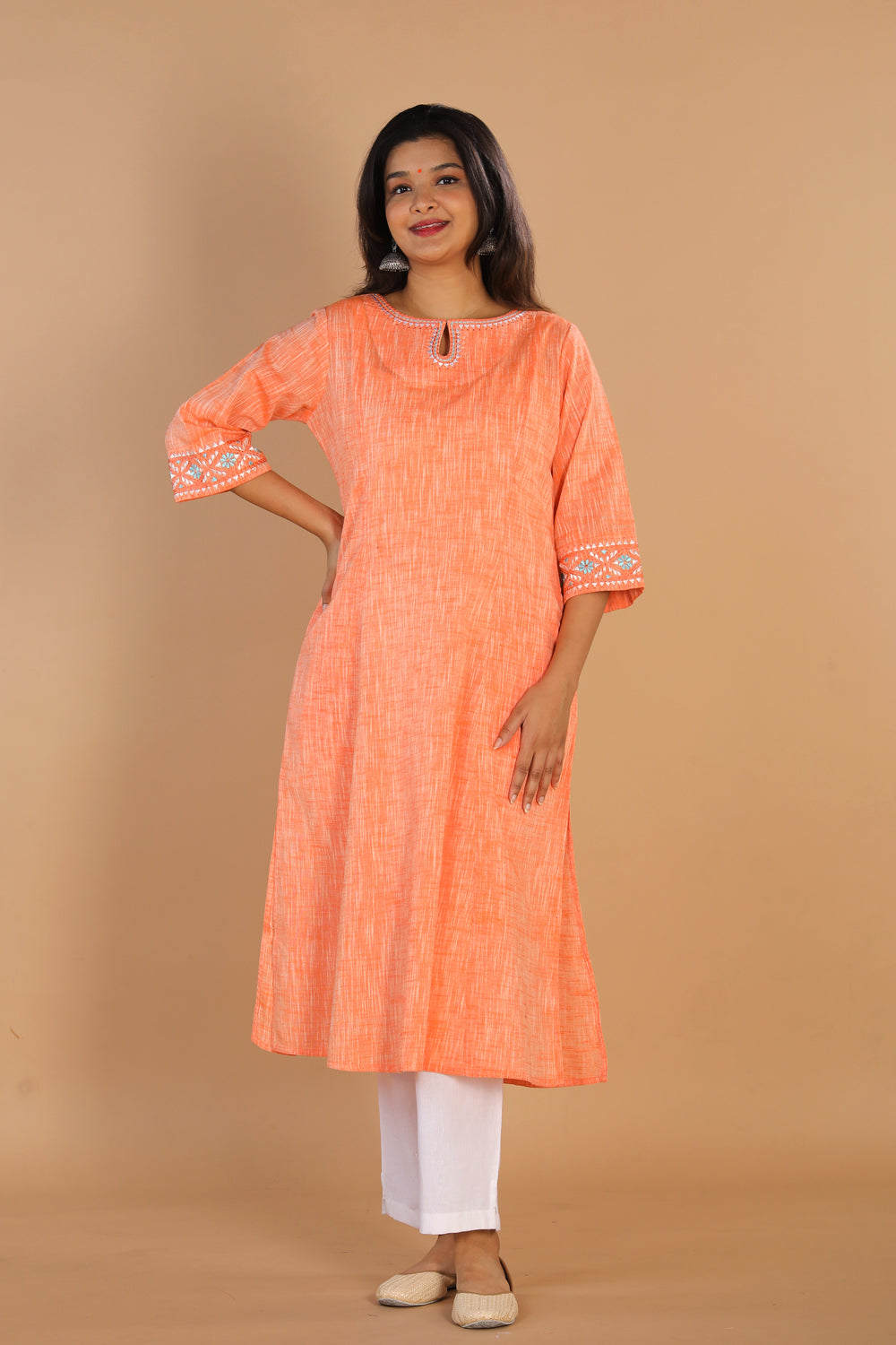 Collection of Traditional embroidered cotton kurta in a gallery layout