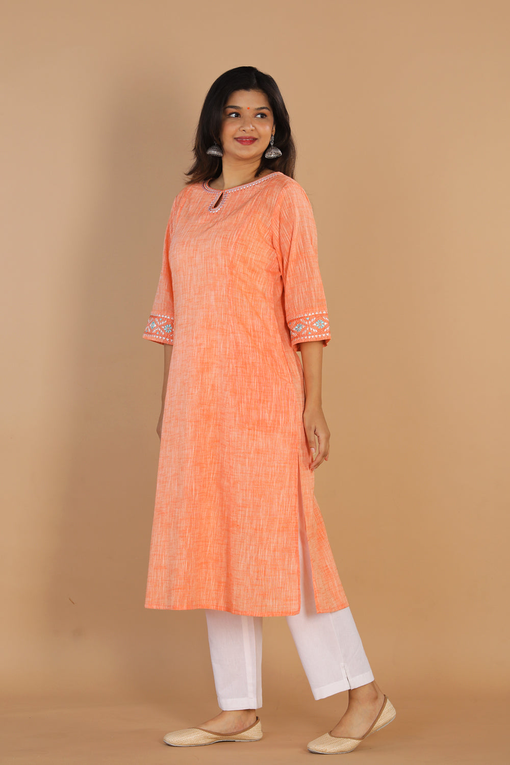 Collection of Traditional embroidered cotton kurta in a gallery layout