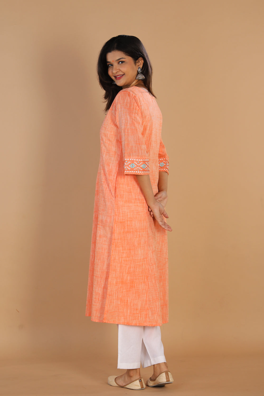 Collection of Traditional embroidered cotton kurta in a gallery layout