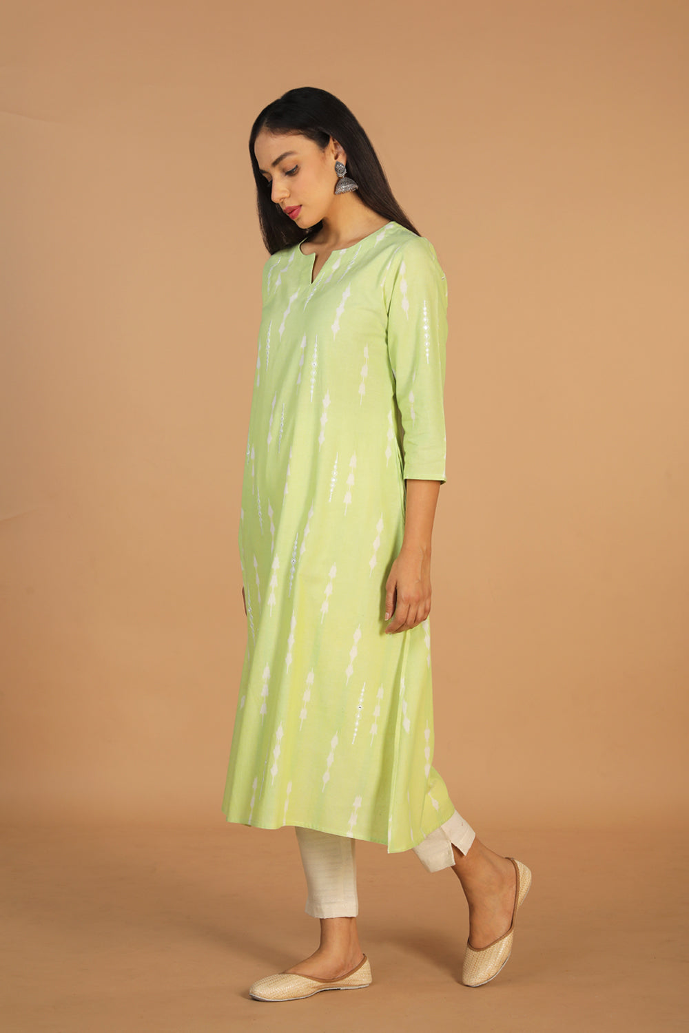 Collection of Tea green embriodered Pochampally Ikat kurta in a gallery layout